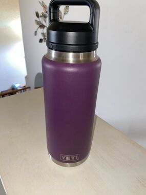 Yeti insulated bottle in purple with black lid
